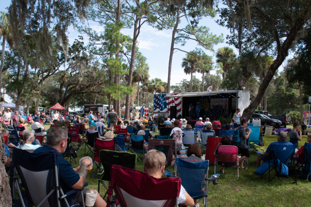 crowd listening to the band play at Creekside 